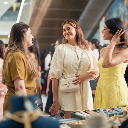 Guests connecting with a stylist at The Pop Up Story
